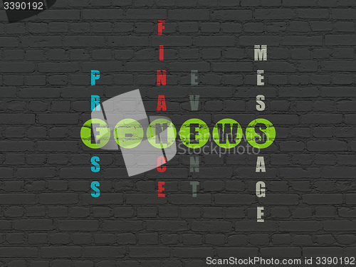 Image of News concept: word E-news in solving Crossword Puzzle