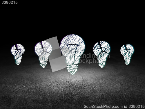Image of Business concept: light bulb icon in grunge dark room