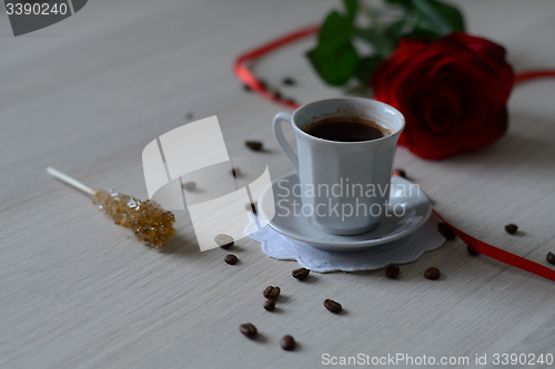 Image of black coffee and a candy sugar