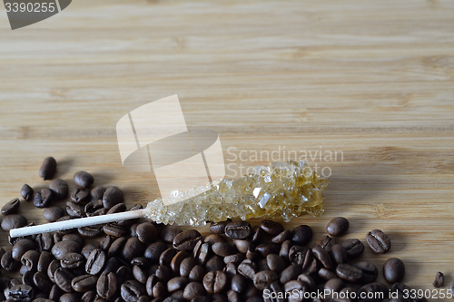 Image of  sugar on a stick with coffee beans