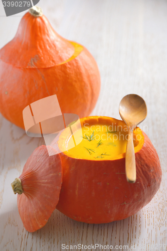 Image of soup with cream in pumpkin