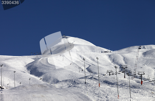 Image of Ski slope at sun evening