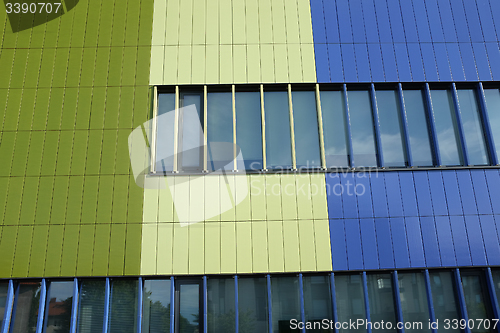 Image of Wall of modern building blue and green color, horizontal photo