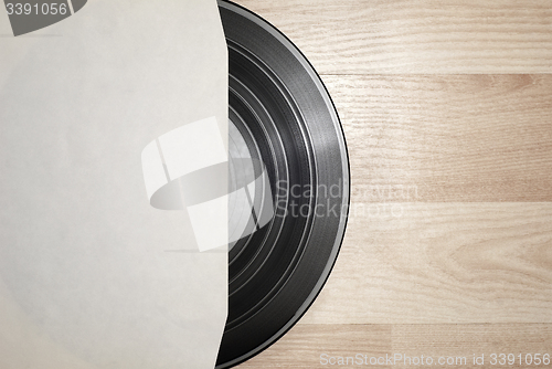 Image of Vinyl record with cover