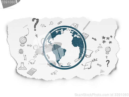 Image of Learning concept: Globe on Torn Paper background