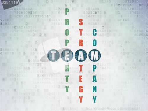 Image of Finance concept: word Team in solving Crossword Puzzle