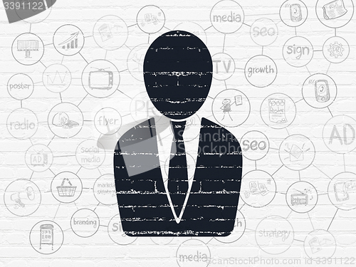 Image of Marketing concept: Business Man on wall background