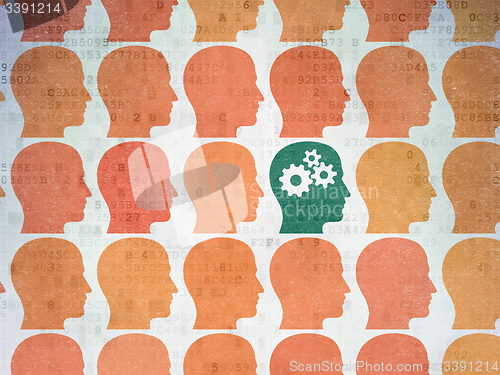 Image of Learning concept: head with gears icon on Digital Paper background