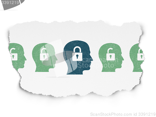 Image of Privacy concept: head with padlock icon on Torn Paper background