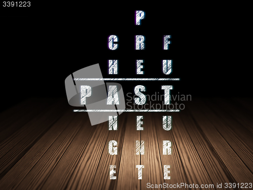 Image of Time concept: word Past in solving Crossword Puzzle