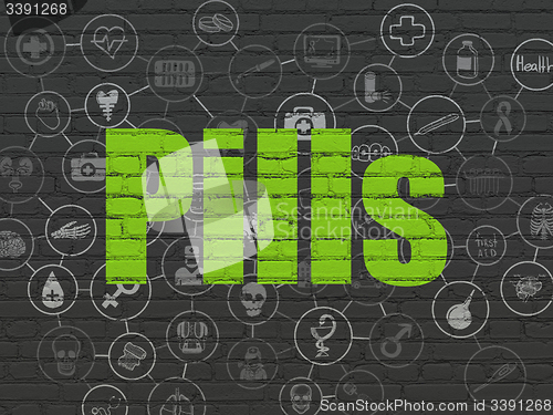 Image of Healthcare concept: Pills on wall background