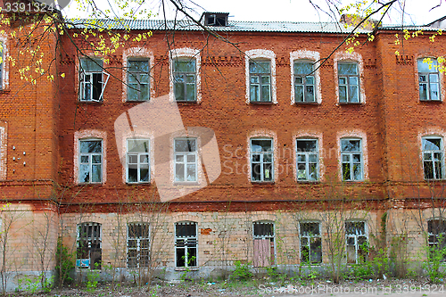 Image of old desolate building from red brick