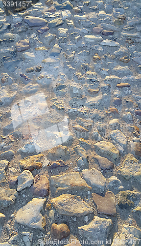 Image of Road surface paved with rough stones