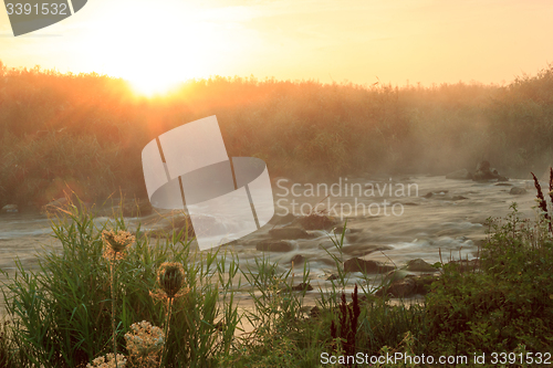 Image of Dawn over Rushing river