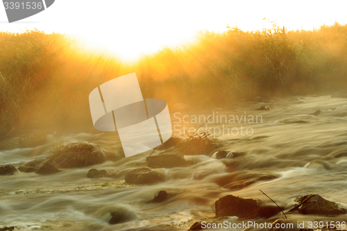 Image of Dawn over Rushing river