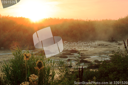 Image of Dawn over Rushing river