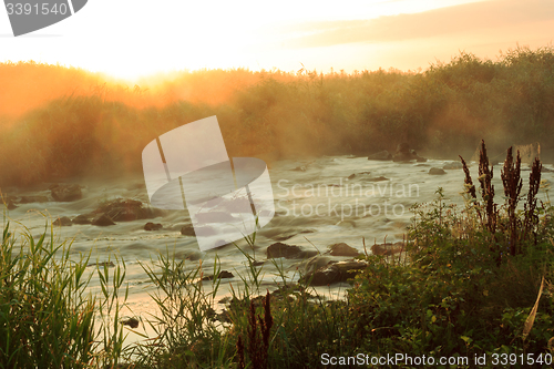 Image of Dawn over Rushing river