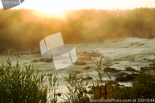 Image of Dawn over Rushing river