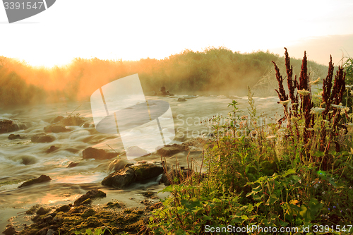 Image of Dawn over Rushing river