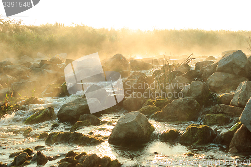 Image of Dawn over Rushing river