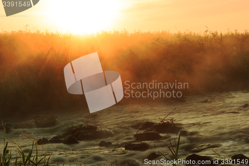 Image of Dawn over Rushing river