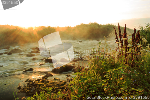 Image of Dawn over Rushing river