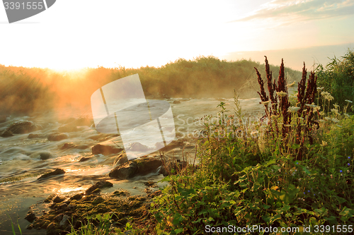 Image of Dawn over Rushing river