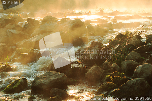 Image of Dawn over Rushing river