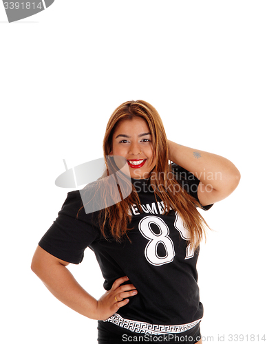 Image of Portrait of girl in black sports outfit.