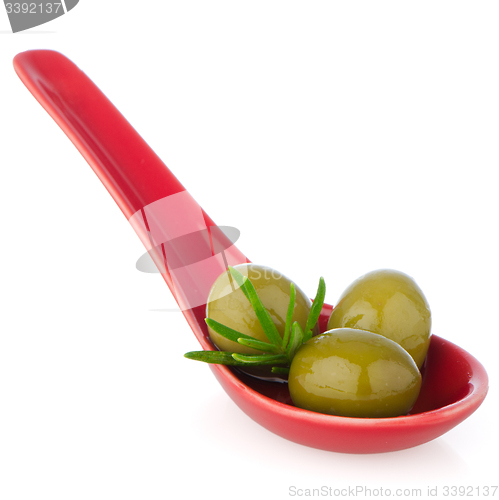 Image of Olives on ceramic spoon