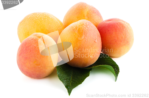 Image of Sweet peaches with leafs