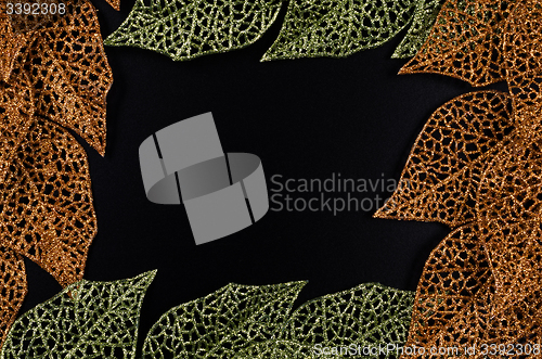 Image of Green and golden leaf frame