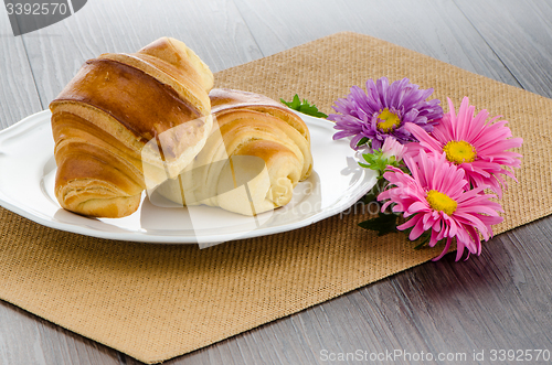 Image of Croissants with orange juice 