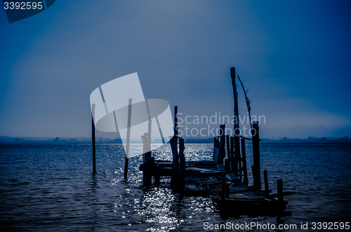 Image of Old dock moon light reflection