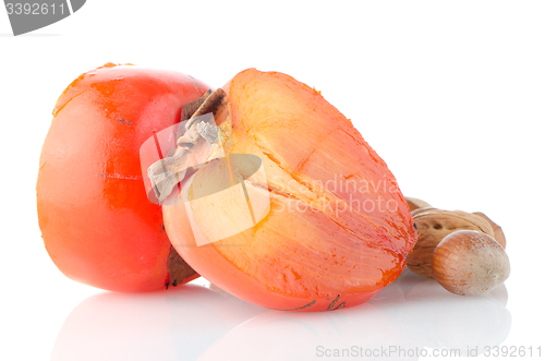 Image of Ripe persimmons and nuts