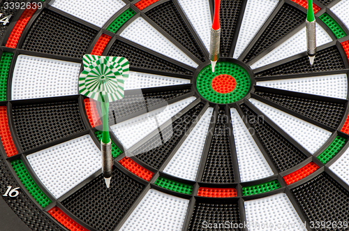 Image of Dart board with darts