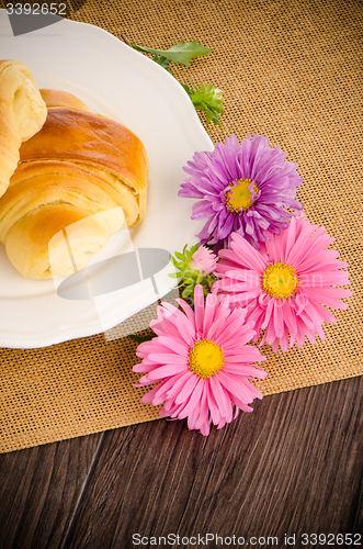 Image of Croissants with orange juice 