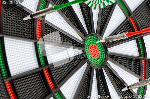 Image of Dart board with darts