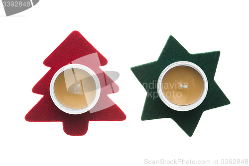 Image of Red star and green pine tree  Christmas decorations with candles