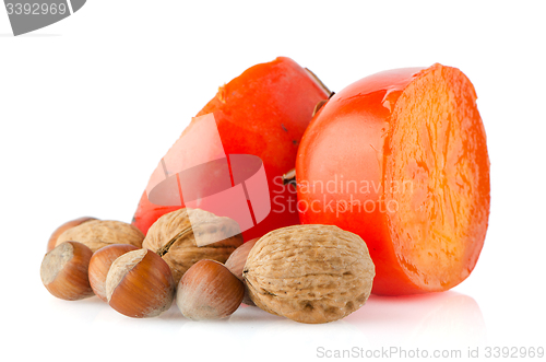 Image of Ripe persimmons and nuts