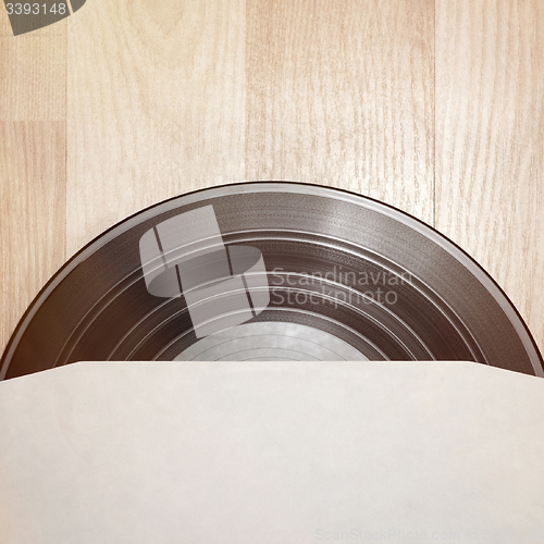 Image of Vinyl record with cover