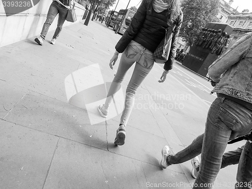 Image of Black and white People walking