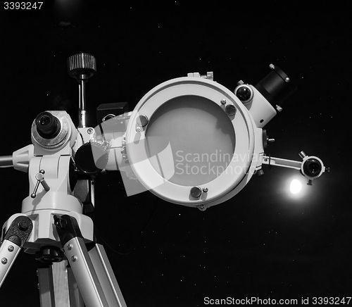 Image of Black and white Astronomical telescope