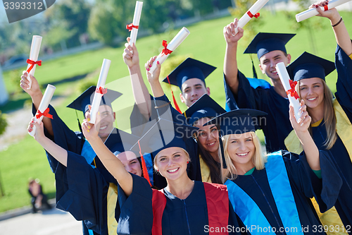 Image of young graduates students group