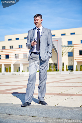 Image of businness man portrait outdoors