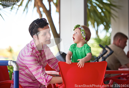 Image of portrait of happy young mother and baby