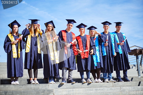 Image of young graduates students group