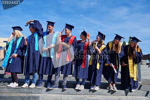 Image of young graduates students group