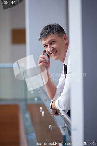 Image of business man using phone