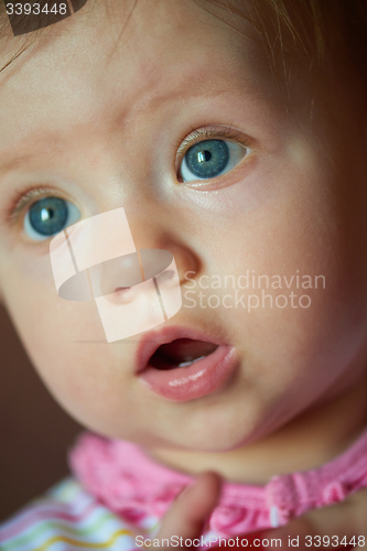 Image of baby playing with toys at home